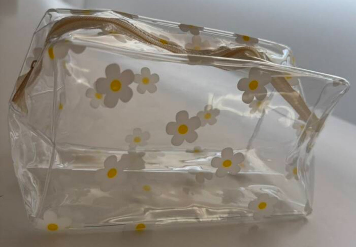 Neceser transparente con flores