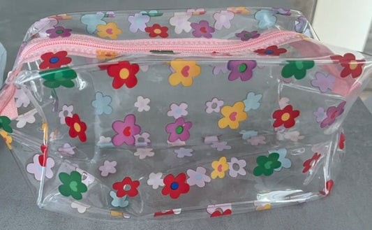 Neceser transparente con flores
